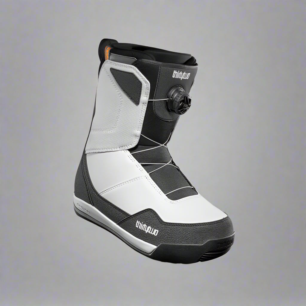 Gray and black boot with 'Triple Two' branding on a white background