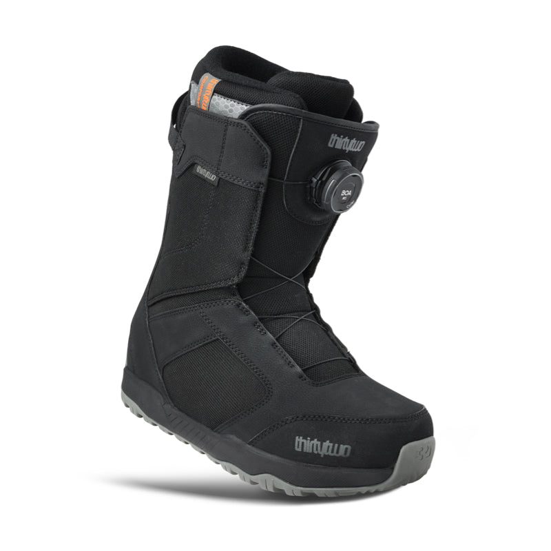 Black snow boot with visible brand logo on a white background