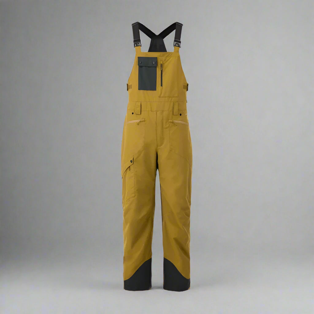 Yellow bib overalls with black accents on a white background