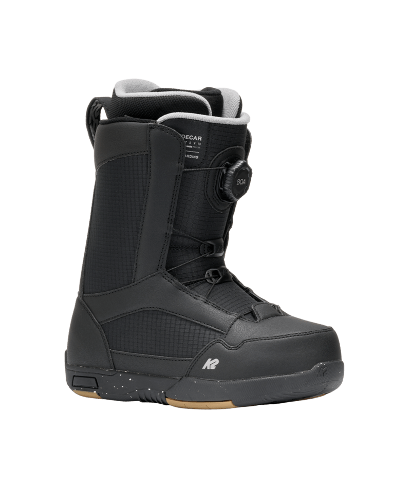 Black snowboard boot with visible branding on a transparent background