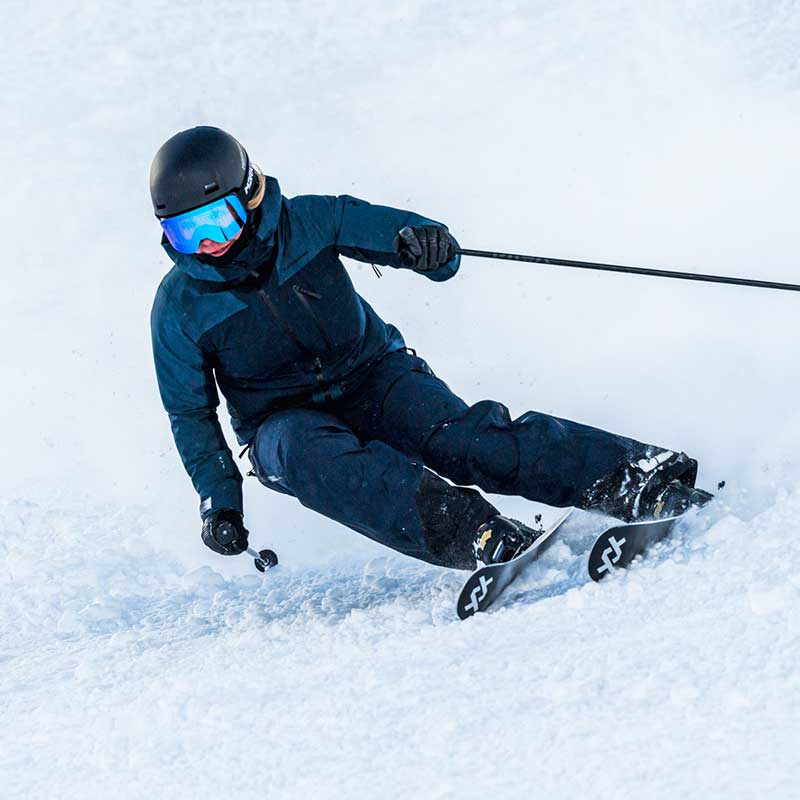 Woman Skier on Volkl Secret 4 Skis