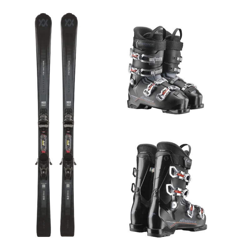 Pair of black ski boots with bindings and two black skis on a white background