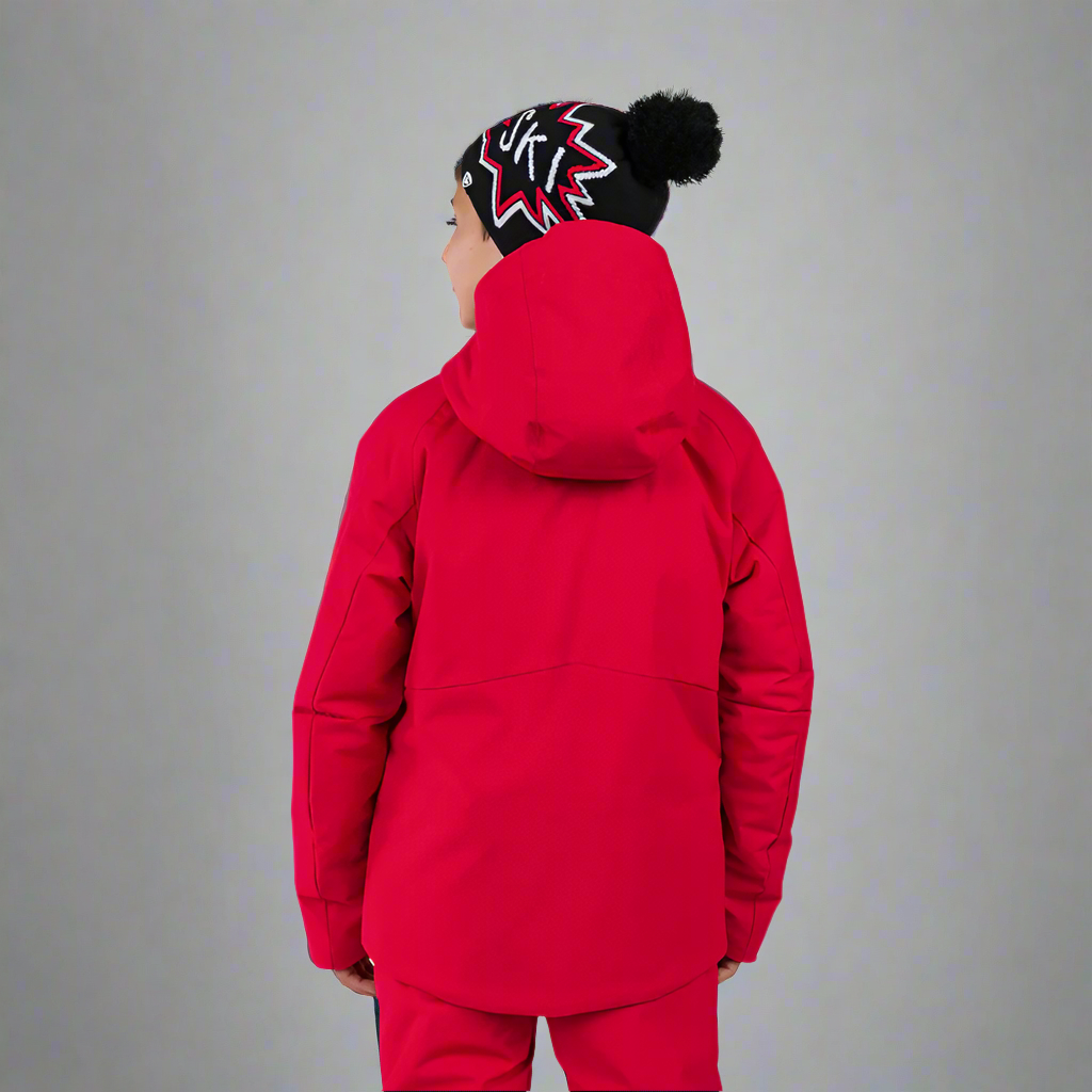 Person wearing a red snowsuit with a black beanie on a white background