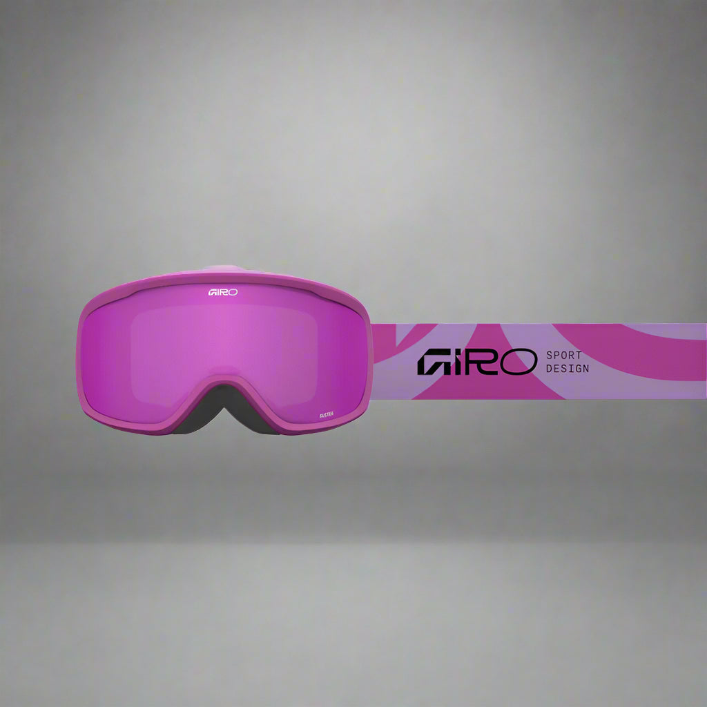 pink ski goggles with 'Giro' branding on a grey background