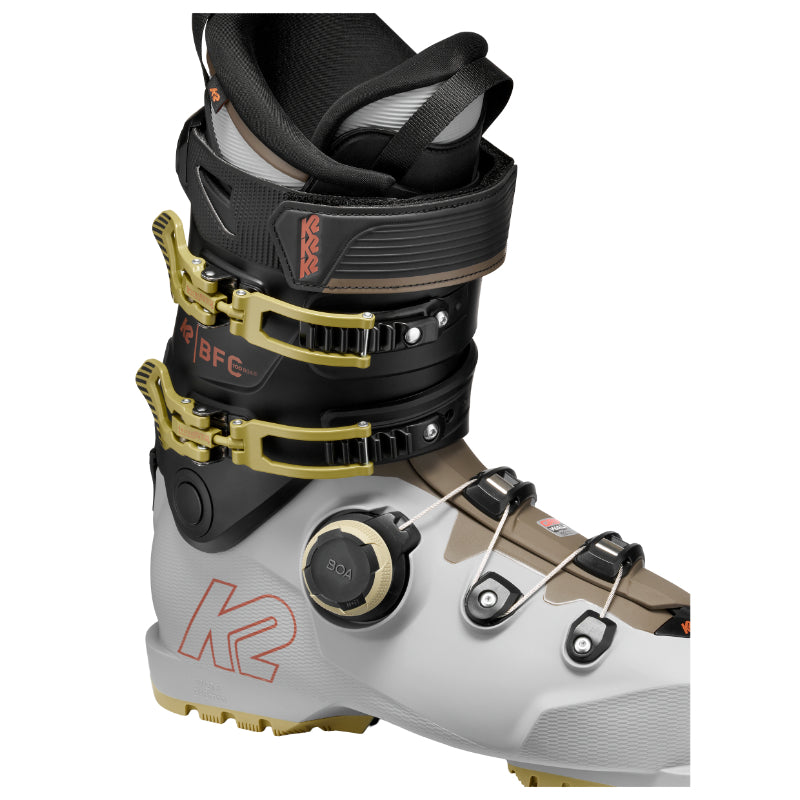 Close-up of a ski boot with visible branding on a white background