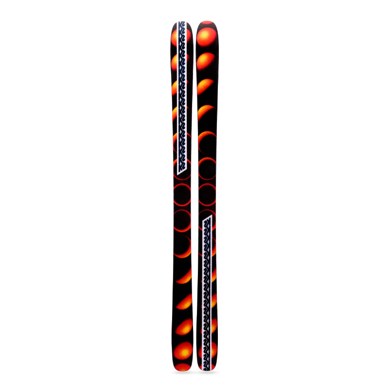 Black and orange skis with a pattern on a white background with k2 branding