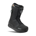 Black snowboard boot with 'thirtytwo' branding on a white background