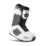 White and black snow boot with 'thirtytwo' branding on a white background