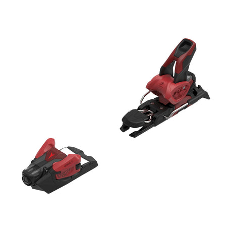 Two ski bindings shown on a plain white background, one upright and one lying on its side. The bindings are primarily black with prominent red accents.