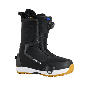 Black snowboard boot with brown sole on a white background