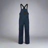 Navy blue bib overalls on a white background