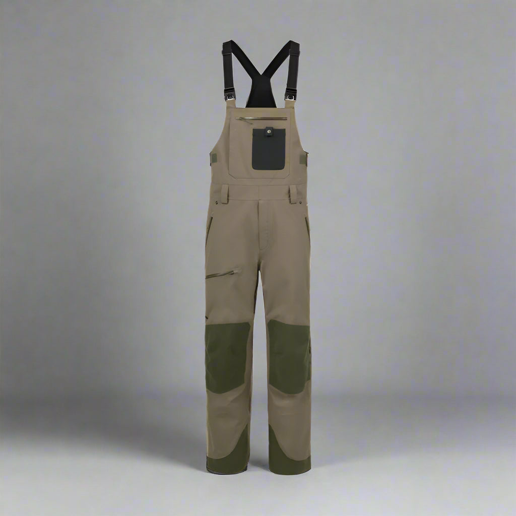 Brown bib overalls with black accents on a white background