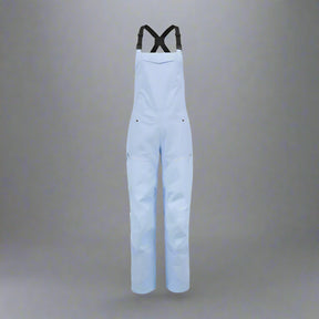 Light blue bib overalls on a white background