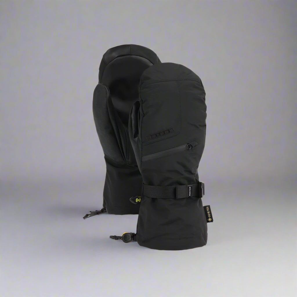 Black ski glove with a strap on a white background