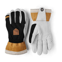 A pair of winter work gloves shown from both sides against a white background. One glove shows the black back with a brown logo patch, and the other shows the light gray front with a black grip pad and tan cuff.