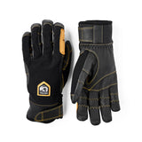 A pair of black heavy-duty work gloves shown from both the back and palm sides, featuring tan protective panels and yellow contrast stitching. A shield-shaped patch on the back glove displays the brand name 'Black Dragon'.