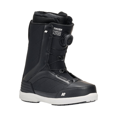 Black snowboard boot with Nidecker branding on a white background