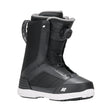 Black snowboard boot with white sole on a white background