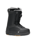 Black snowboard boot with visible branding on a transparent background
