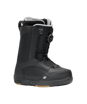 Black snowboard boot with visible branding on a transparent background
