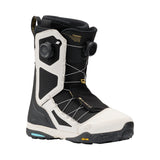 Black and white snowboard boot with visible brand logos on a white background