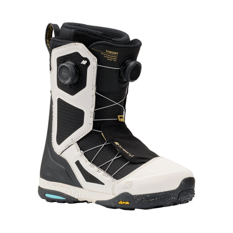 Black and white snowboard boot with visible brand logos on a white background