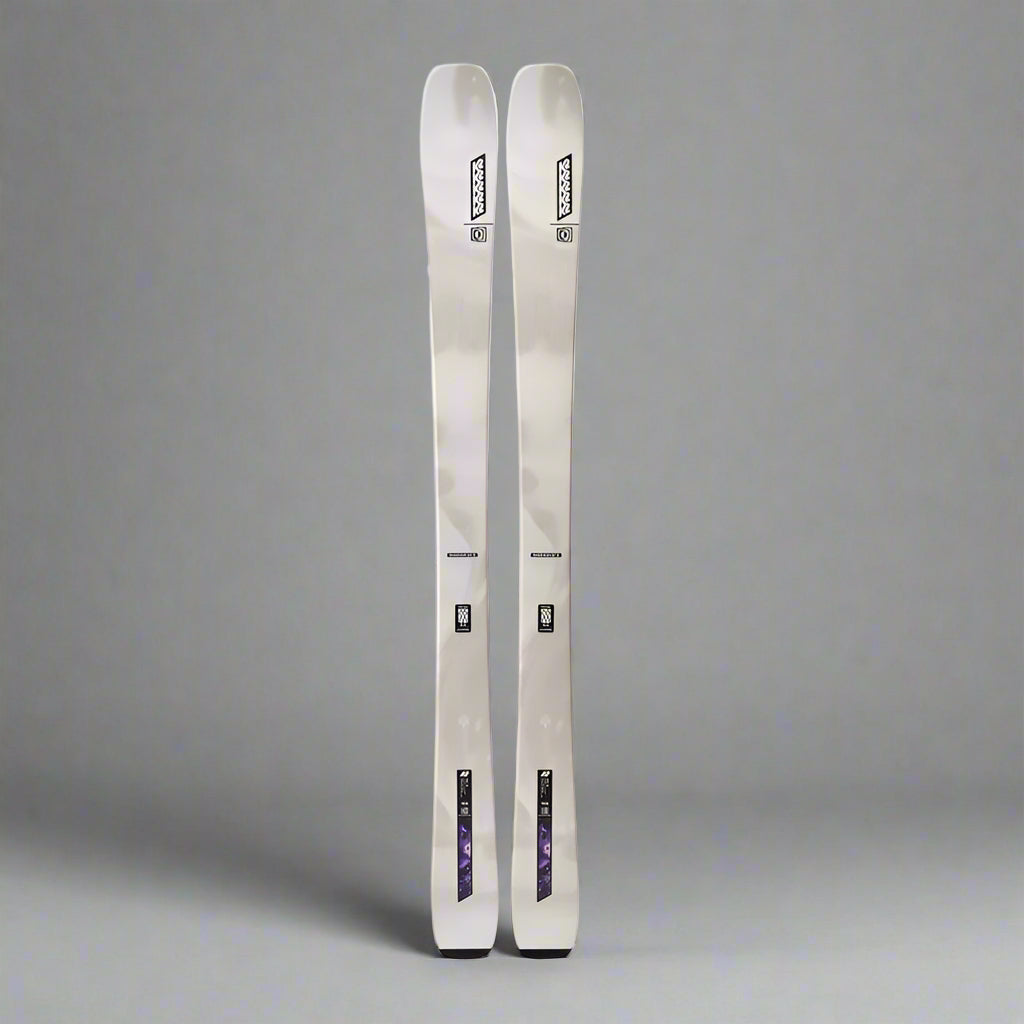 Two skis with bindings on a white background
