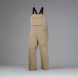 Khaki bib overalls with black straps on a white background