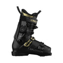 A Salomon ski boot in black with gold accents, featuring a dial closure system and a quick-release buckle, shown from a side profile on a white background.