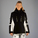 Person wearing a black and white jacket on a light gray background