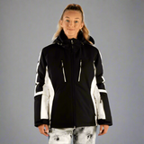 Person wearing a black and white jacket on a light gray background