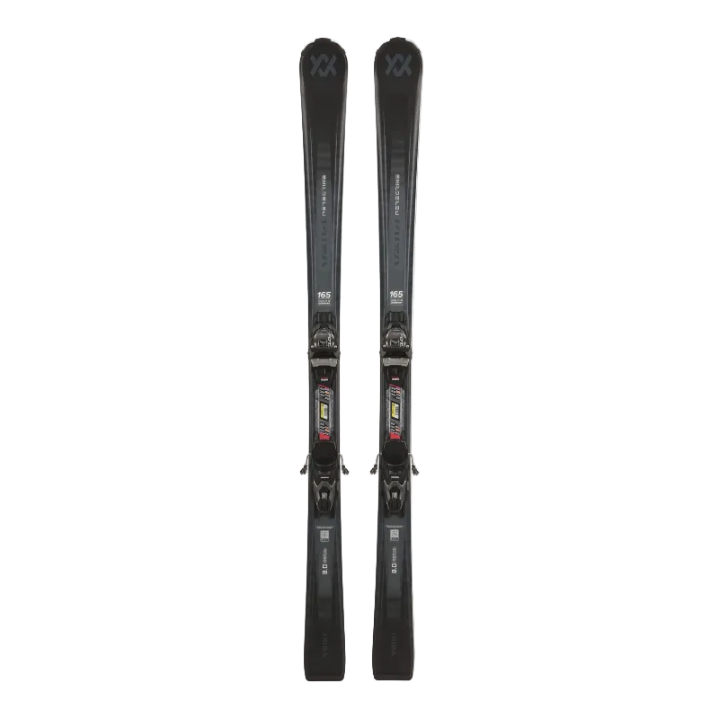 Pair of black skis with bindings on a white background