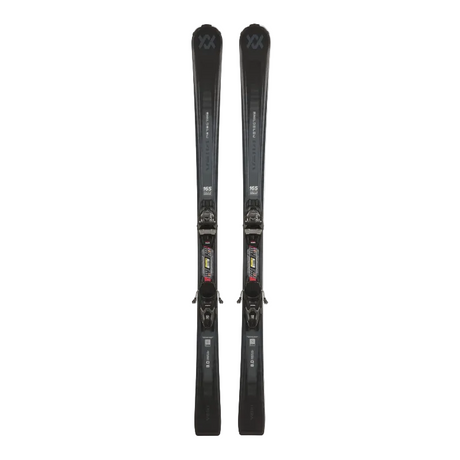 Pair of black skis with bindings on a white background