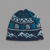Knitted beanie with a blue and white pattern on a white background