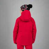 Person wearing a red snowsuit with a black beanie on a white background