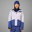 Person wearing a blue and gray ski jacket on a white background