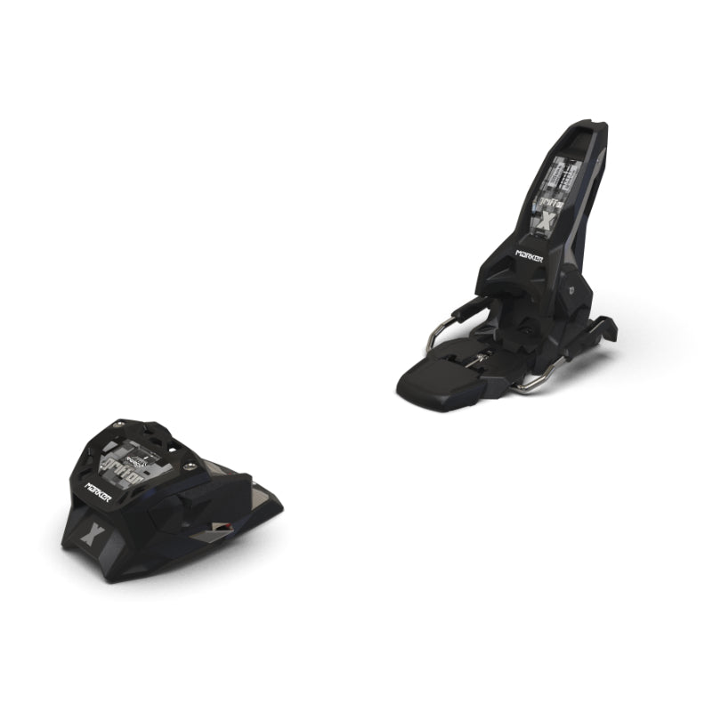 Pair of black ski bindings on a white background