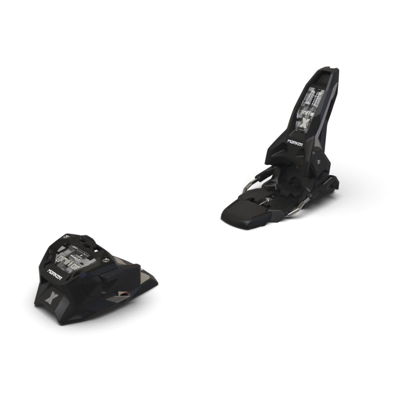 Pair of black ski bindings on a white background