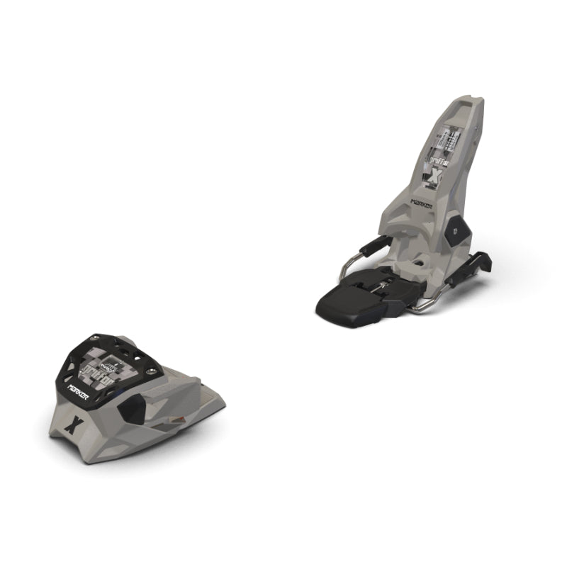 Pair of Tan ski bindings on a white background