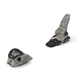 Tan ski bindings on a white background