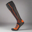 Black and orange compression sock on a white background