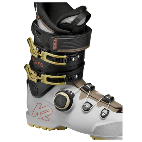 Close-up of a ski boot with visible branding on a white background