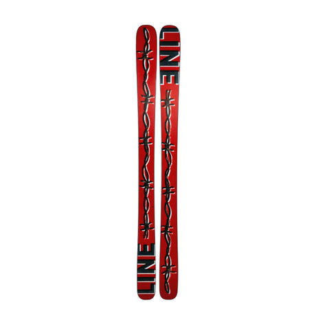 Red and black skis with barbed wire design on a white background