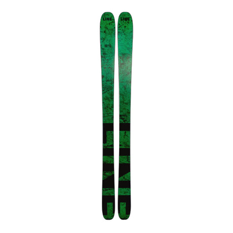 Green and black skis on a white background