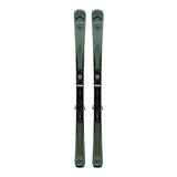 Pair of green skis with bindings on a light gray background