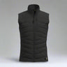 Black quilted vest on a grey background