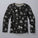 Smartwool thermal merino crew kids Black long-sleeve shirt with white graphic patterns on a white background