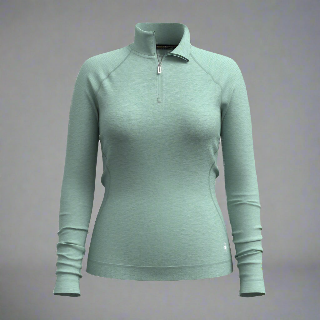 Light green long-sleeve pullover with a quarter zip on a grey background
